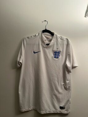 Nike England Men's White Football Jersey with Blue Swoosh